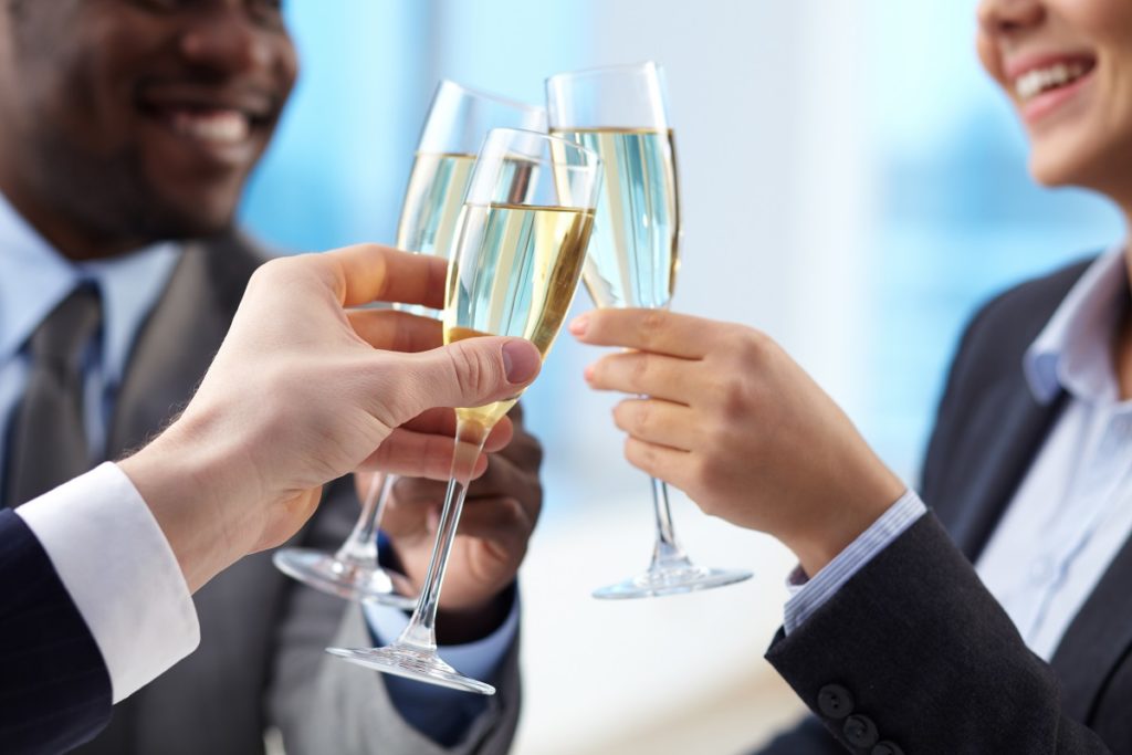 company employees drinking champagne
